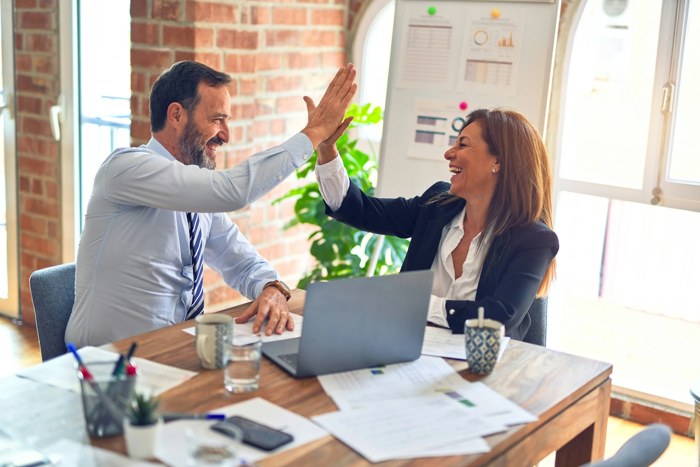 Happy business people working togheter